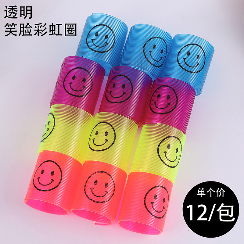 สไตล์ใหม่ 3.2 * 3.5 ซม. โปร่งใสหน้ายิ้มขนาดเล็กสายรุ้งแหวนพลาสติกฤดูใบไม้ผลิแหวนเด็กซ้อนของเล่น