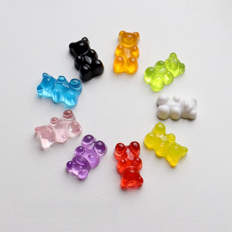 รองเท้าสไตล์ Gummy Bear ออกแบบมาพร้อมหัวเข็มขัดและประดับด้วยดอกไม้
