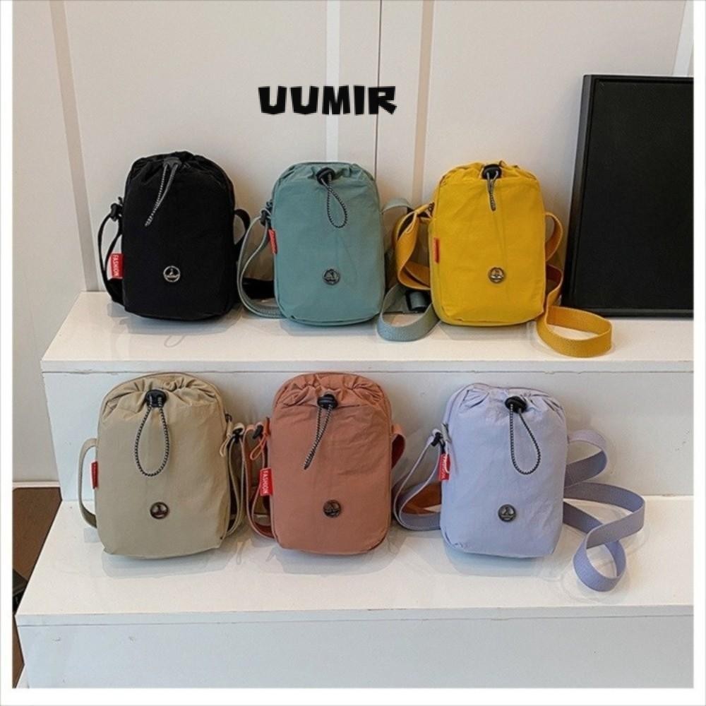 ยูมิร์ กระเป๋าสะพายข้างสไตล์กีฬา ผลิตจากผ้าไนลอน ขนาดกะทัดรัด สีทึบ มีเชือกรูด
