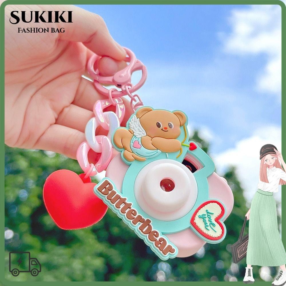 พวงกุญแจหมีเนย SUKIKI พวงกุญแจกระดิ่งของเล่น PVC จี้กระเป๋าตุ๊กตาหมีเนยของขวัญ