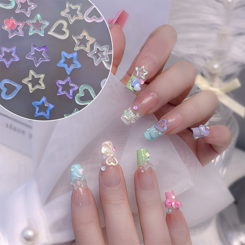 Renbg 50 ชิ้นผสมสีสันตกแต่งเล็บโปร่งใส Hollowed Star Heart Charm อะไหล่เล็บ 3D เรซิ่น Flatback อุปกรณ์เสริม TH