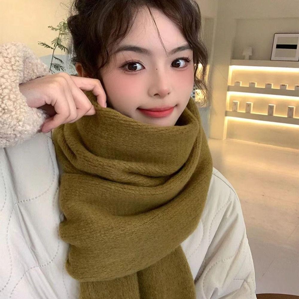 ผ้าพันคอแคชเมียร์สีทึบ ดีไซน์พู่ยาว สวมใส่สบายในฤดูหนาว - รูปที่ 7