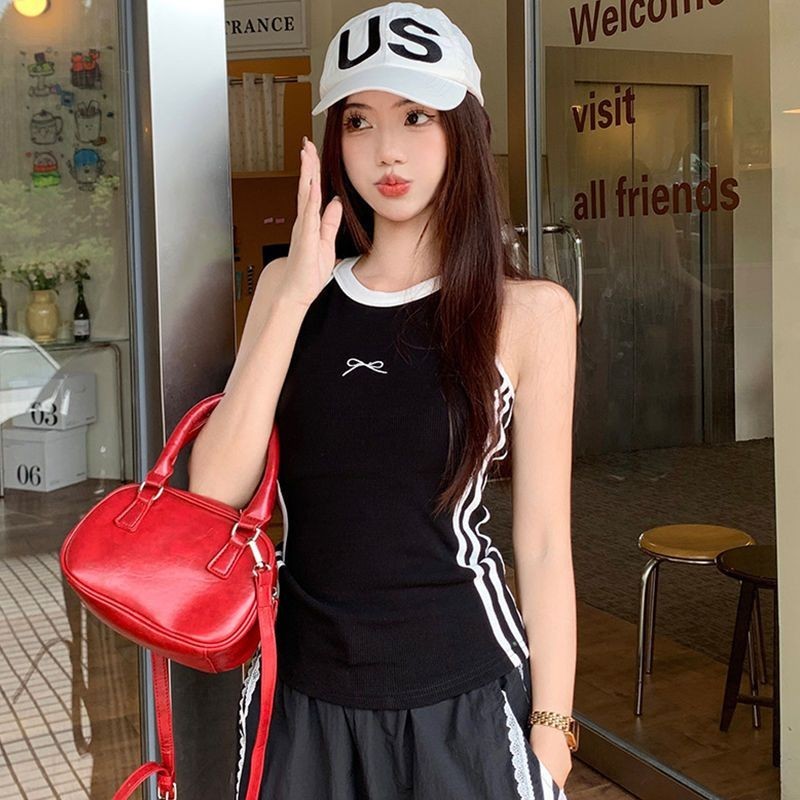เสื้อกล้ามที่สวยงามผูกโบว์ลายสลิมมิ่งสไตล์เย็นของผู้หญิง