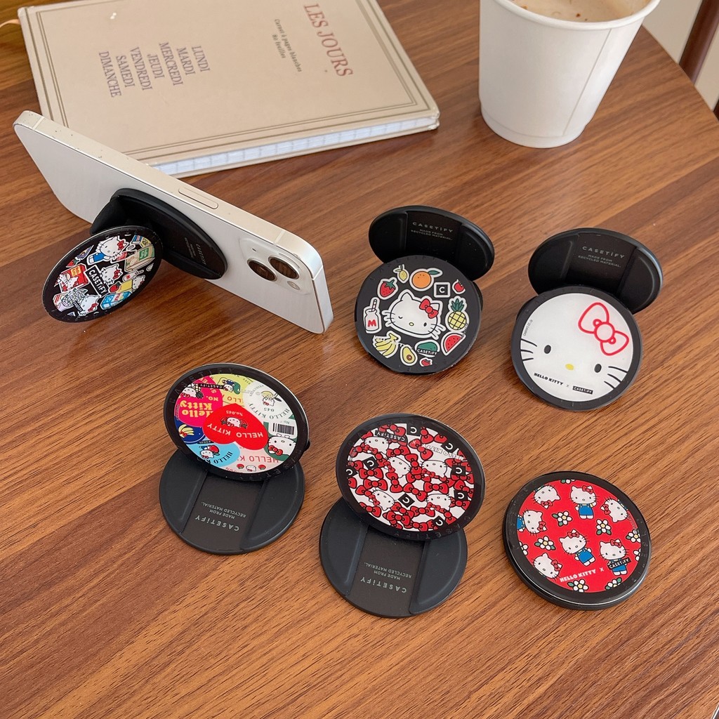 Heello Kittyที่วางโทรศัพท์ Kickstand น่ารักการ์ตูน Creative Magnetic Attraction Stand สําหรับ Naked โทรศัพท์มือถือ Magsafe กรณีแท็บเล็ตโทรศัพท์มือถือพับ Anti-drop PC Bracket