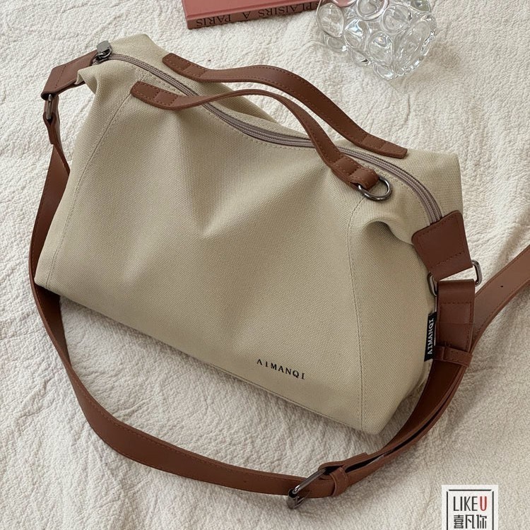 [จัดส่งฟรี] ญี่ปุ่นเกาหลีแฟชั่น Simple Commuter ผ้าใบกระเป๋าถือ Tote วรรณกรรม Casual All-Match กระเป๋าสะพายนักเรียนแบบพกพา Messenger กระเป๋า