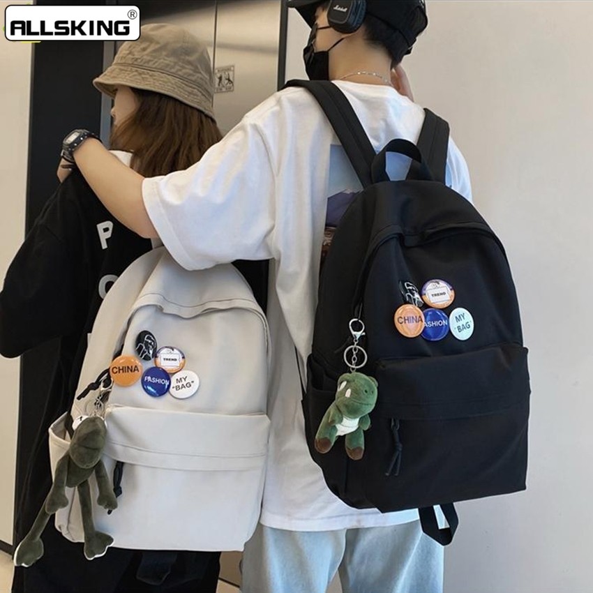 Allsking กระเป๋าเป้ Backpack กระเป๋าสะพายหลังนักเรียน ผู้หญิงเเละผู้ชาย มี 2 สีให้เลือก ความจุขนาดใหญ่ ฟรีเข็มกลัด