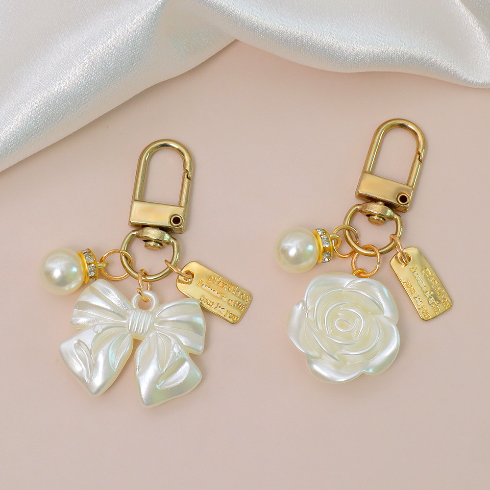 ประณีต Faux Pearl Rhinestone พวงกุญแจอะคริลิคดอกไม้ Bowknot จี้พวงกุญแจผู้หญิงกระเป๋าถือเครื่องประดับ