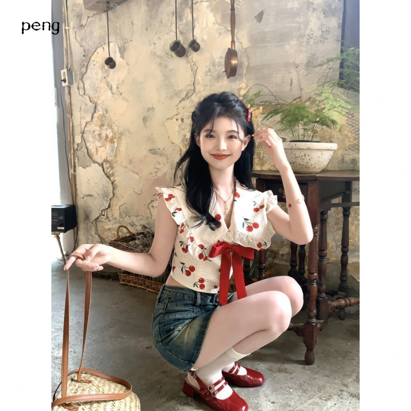 peng รุ่นเกาหลีของโบว์ดอกไม้ที่สดและหวานตัดกันเสื้อแขนกุดพิมพ์เชอร์รี่ฤดูร้อน