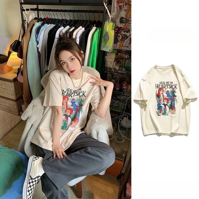 (จัดส่งตลอด 24 ชั่วโมง)พร้อมส่ง เสื้อยืดลายการ์ตูนผู้หญิงน่ารัก Oversize เสื้อผ้าย้อนยุค เกาหลี พิมพ์ลายเท่ คอกลมแขนสั้น