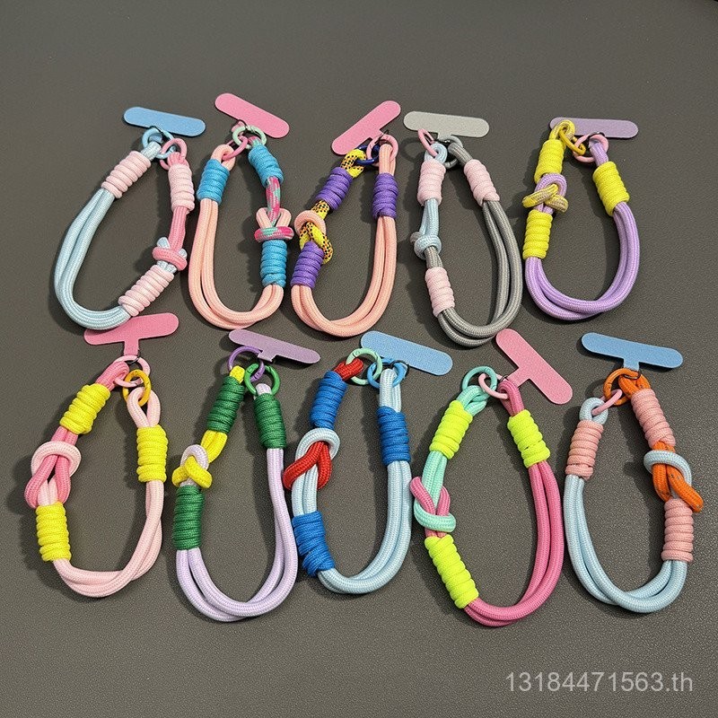 สายคล้องข้อมือแบบจับคู่สีเคสมือถือแบบสั้นป้องกันการสูญหายของโดพามีนรุ่นใหม่ที่มีมูลค่าสูงปะเก็นการ์ดสีสายคล้องมือผู้หญิง