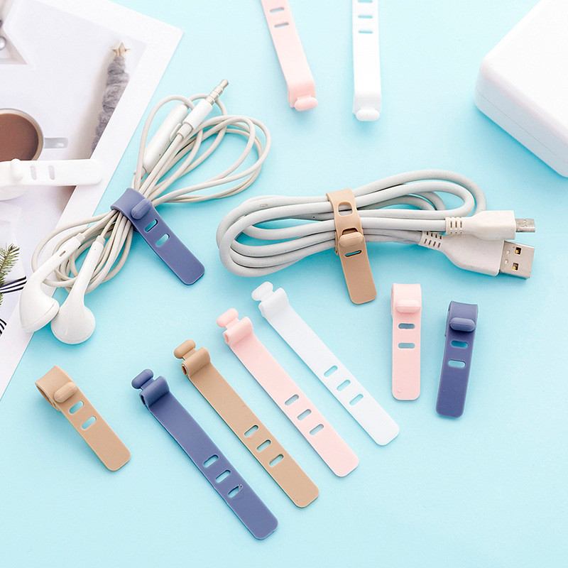 4 ชิ้นสาย Winder Organizer ซิลิโคนหูฟังคลิปสายไฟการจัดการหัวเข็มขัดสายรัดนํากลับมาใช้ใหม่สาย Tie Beam Line ผู้ถือสายไฟ