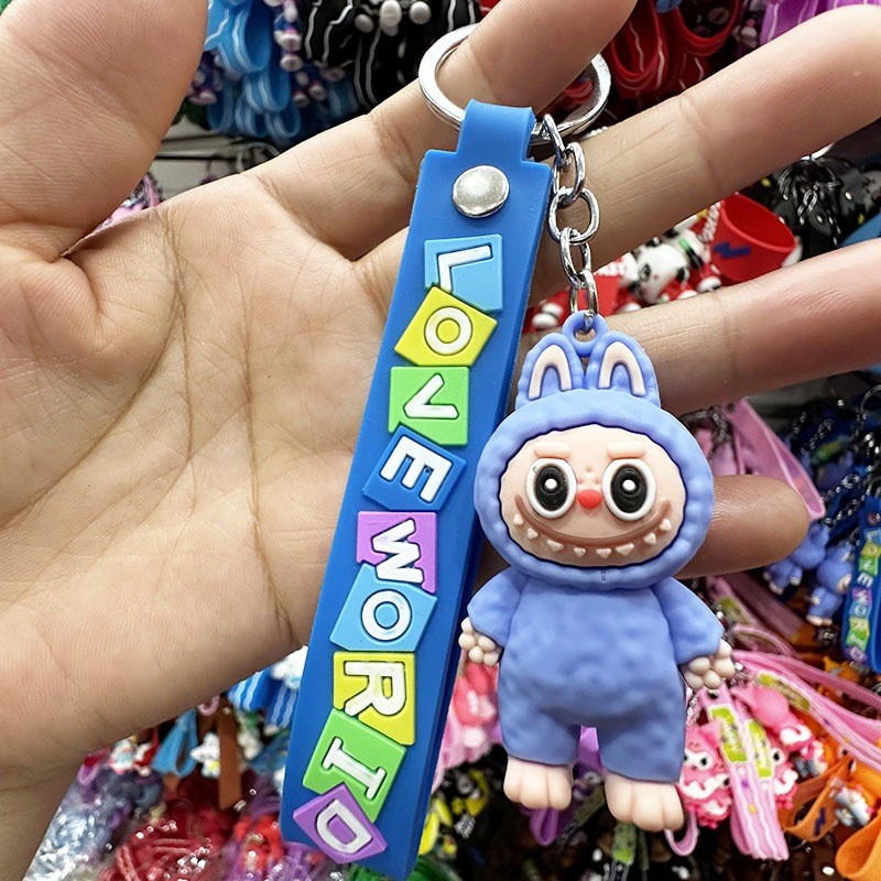 พวงกุญแจ จี้ตุ๊กตาการ์ตูน Labubu PVC ป้องกันการสูญหาย แบบสร้างสรรค์ มี4สี