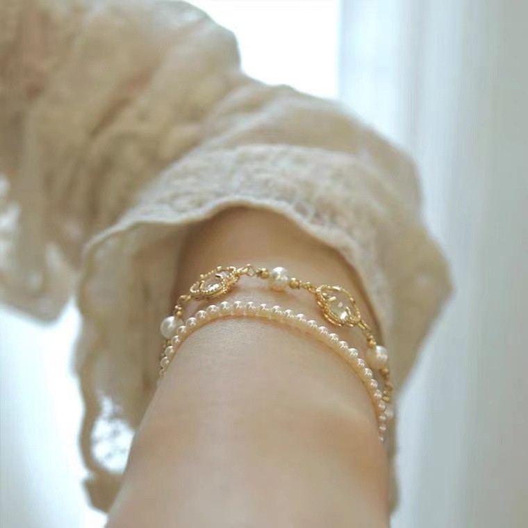 สร้อยข้อมือมุกสาวแสงหรูหราซอกการออกแบบระดับไฮเอนด์ความรู้สึกแฟนนักเรียนสร้อยข้อมือย้อนยุคลูกปัดสไตล์จีน