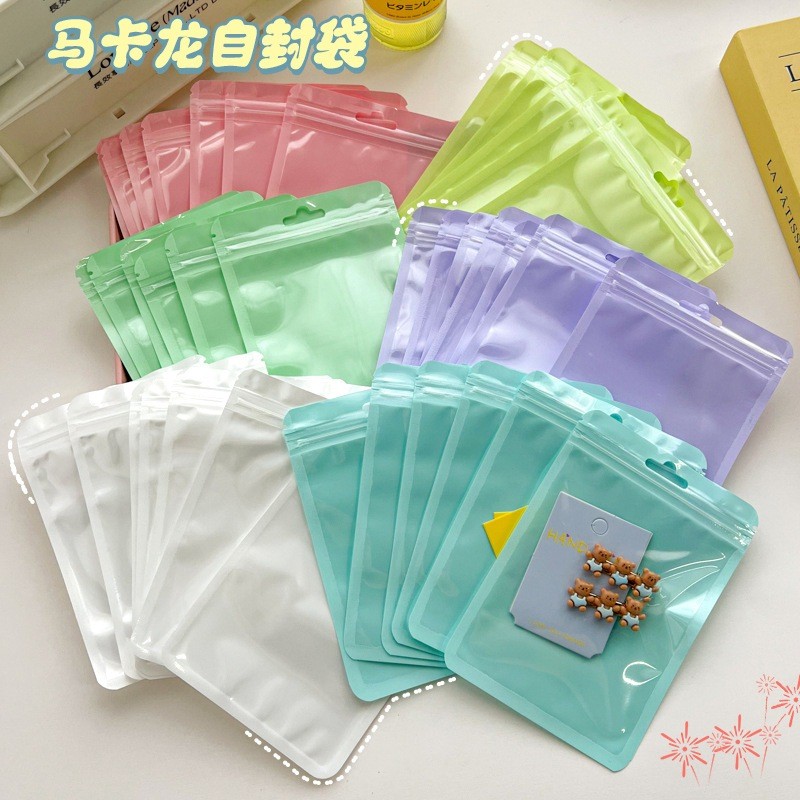 O771 ซองซิปสีมาการอง สีหวาน ใส่ขนม ใส่ธนบัตร กันเปียกได้