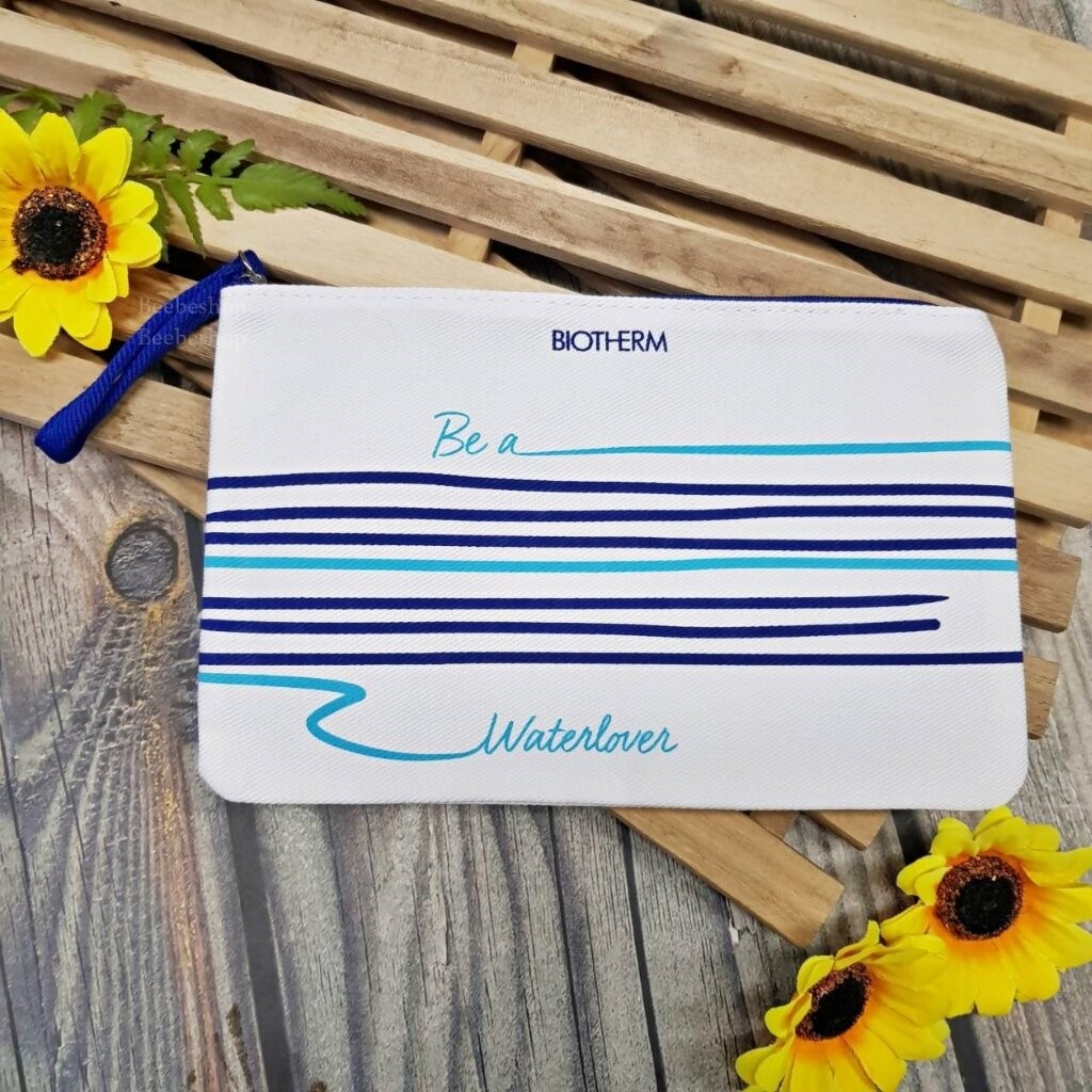 กระเป๋า Biotherm ขาวลายเส้นตรง ทรางสี่เหลี่ยม