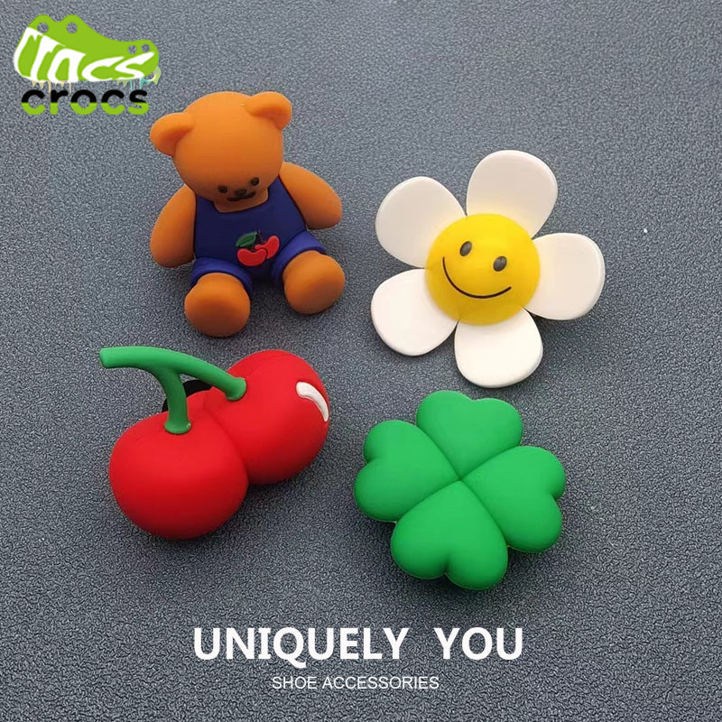 ใหม่ crocs Jibbitz Charms Sunflower Bear Smiley Flower Series Hole รองเท้าหัวเข็มขัด