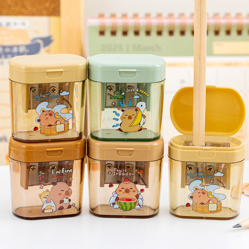 สีการ์ตูน Double Hole กบเหลาดินสอโปร่งใสนักเรียน Mini กบเหลาดินสอเครื่องเขียน WJ803