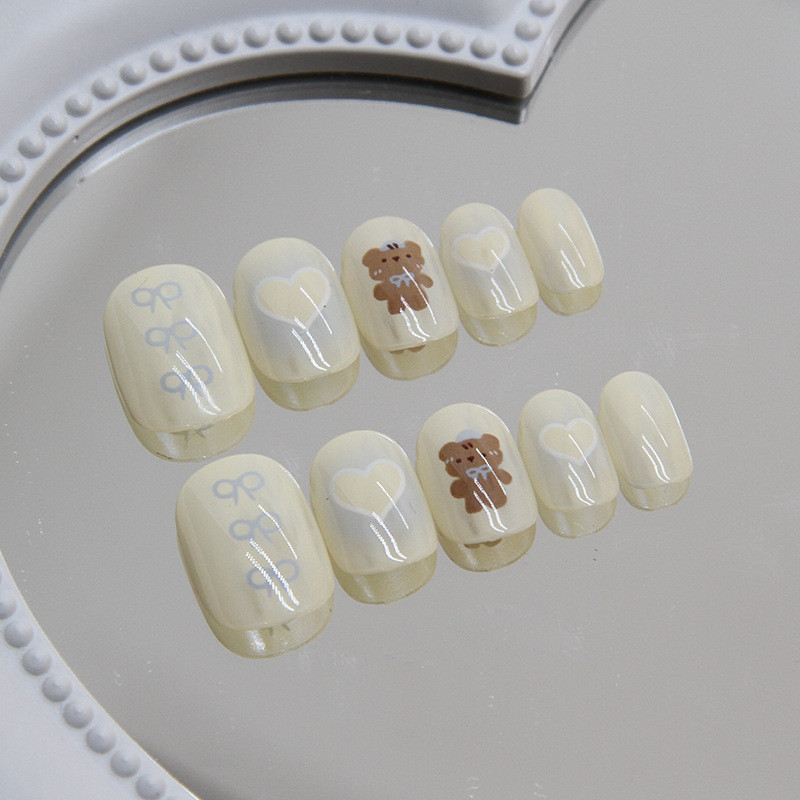 เด็กสวมเกราะรักโบว์เล็บแพทช์เล็บสั้นขนาดเล็กสดเล็บปลอมชุด