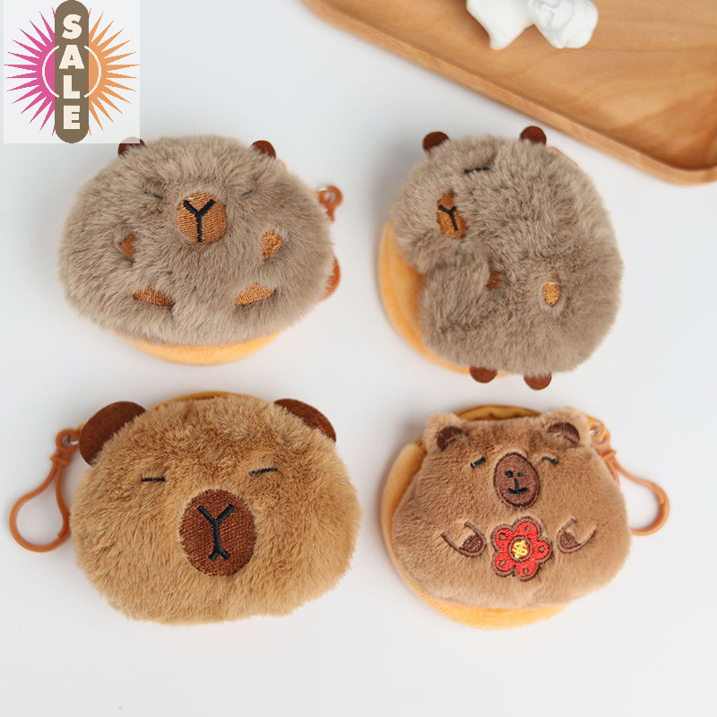 On Creative Capybara Kawaii อะนิเมะตุ๊กตากระเป๋าน่ารักการ์ตูนรอบกระเป๋าจี้ตลก Mini แฟชั่นหูฟังกระเป๋าเก็บ A