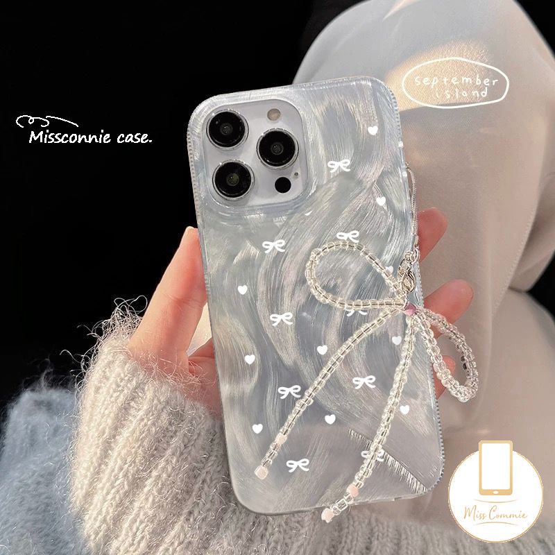 หรูหราfeatherเส้นด้ายนุ่มสําหรับiphone 15 13 11 14 12 Pro MAX 7Plus XR X 7 15 14 8 Plus XS MAX SE 2022 DreamyสีขาวLove Heart Bowknotแฟชั่นโบว์สร้อยข้อมือกรณี