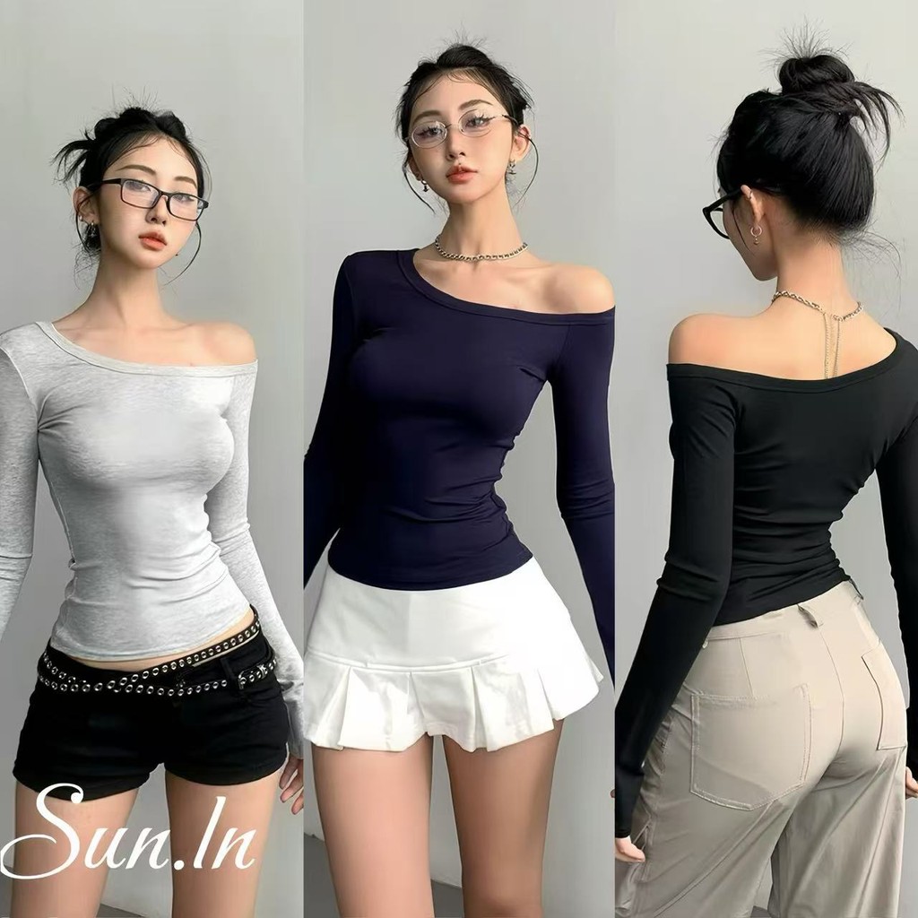 SUN พร้อมส่ง เสื้อยืดแขนยาวไหล่เฉียงสีทึบดีไซน์เรียบง่ายสำหรับสาวร้อนเสื้อครอปสั้นรัดรูป เสื้อยืดผ้าฝ้ายที่ใส่สบายแล