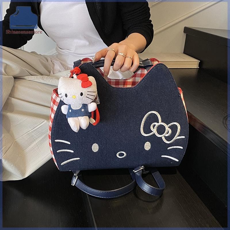 SHINE Sanrio Hello Kitty กระเป๋าเป้สะพายหลังดีนิม สไตล์น่ารัก มีความจุมากสำหรับการเดินทางและใช้งานทั่วไป KT Cat Girly