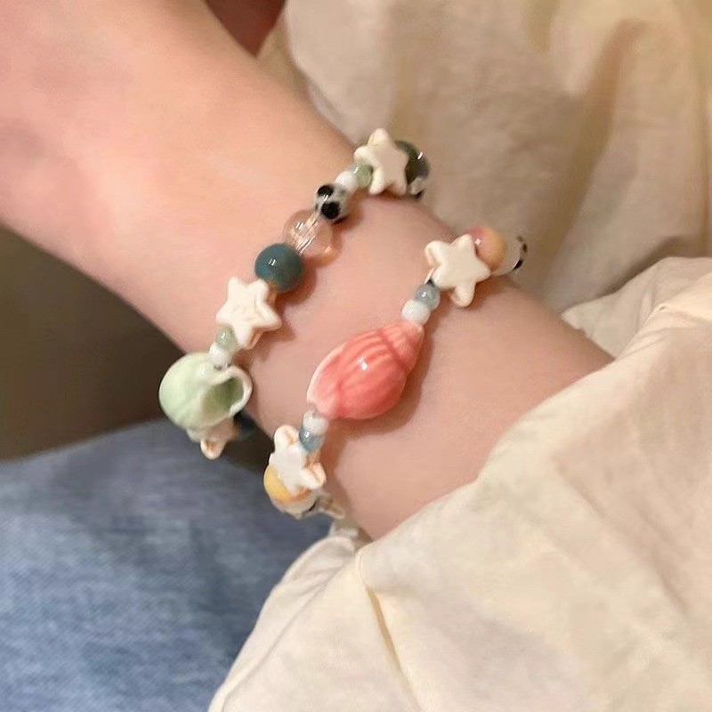 เดือน แฟชั่นสังข์ดาวสร้อยข้อมือลูกปัดเซรามิกเครื่องประดับมือขนาดเล็กสําหรับผู้หญิง