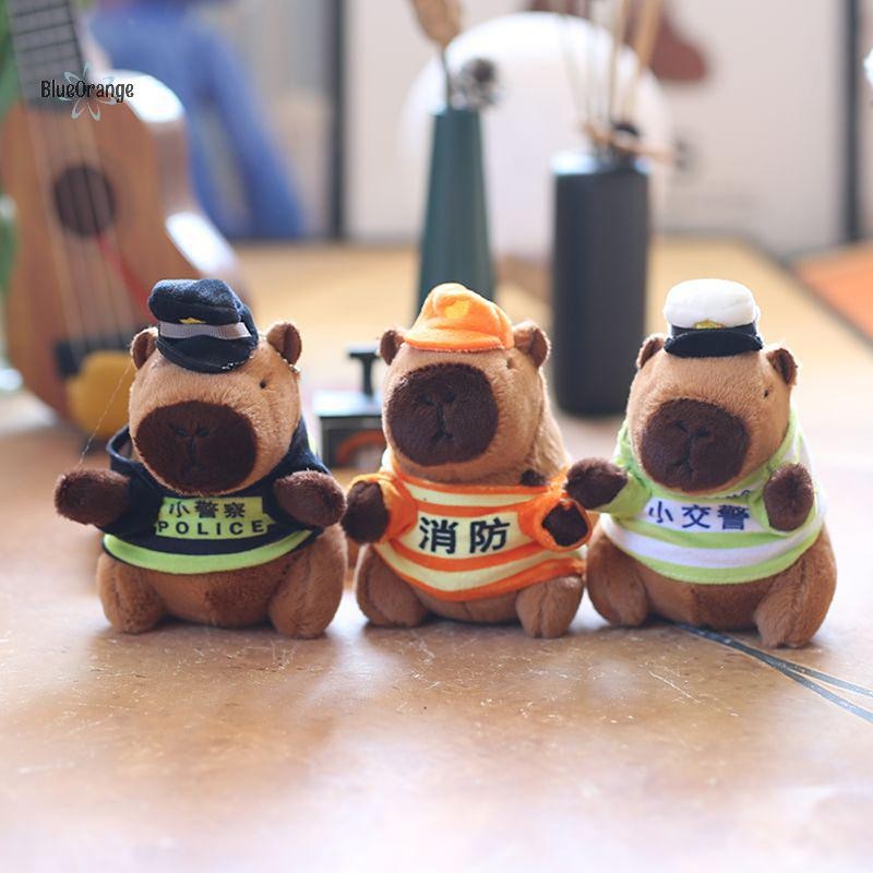 ใหม่ น่ารักตํารวจดับเพลิง Capybara พวงกุญแจการ์ตูนตุ๊กตา Kapibala ตุ๊กตากระเป๋าเป้สะพายหลังจี้กระเป๋าแขวน Key Chain ของขวัญสร้างสรรค์ร้อน