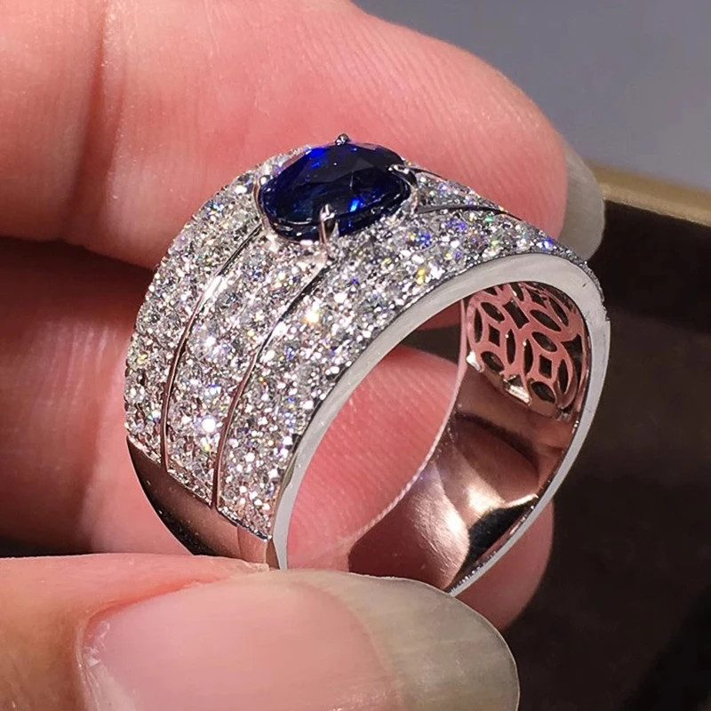 แฟชั่น 925 เงินประกายผู้หญิงแหวนรูปไข่สีฟ้า Cz กว้างวง งดงาม อุปกรณ์จัดงานแต่งงานสีเงิน ฉลาดที่สุด เครื่องประดับแฟชั่น