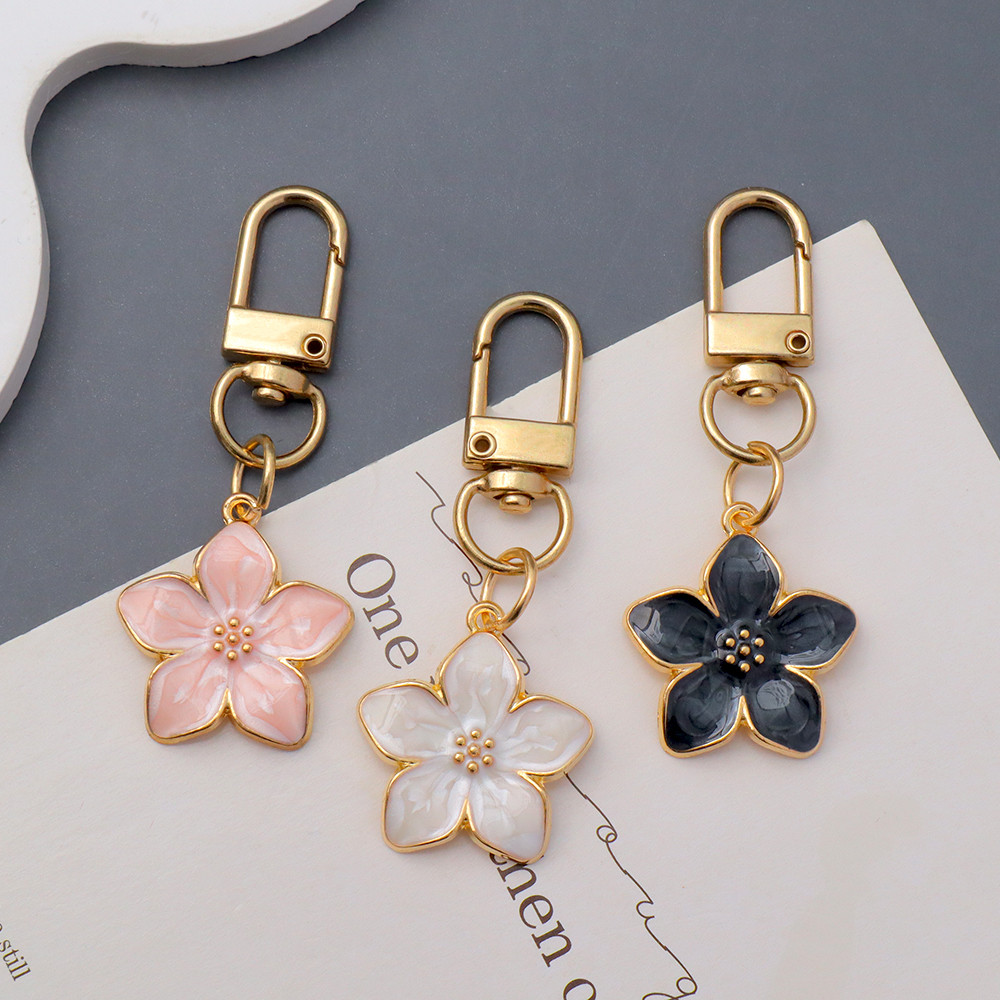 หวานโลหะซากุระพวงกุญแจที่เรียบง่ายเคลือบเชอร์รี่ดอกไม้พวงกุญแจหูฟังกรณีจี้ผู้ถือกุญแจรถของขวัญเพื่อนของที่ระลึก - รูปที่ 3