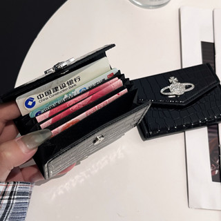 กระเป๋าสตางค์ขนาดใหญ่ ออกแบบโดยเวสต์วูด กะทัดรัดด้วยลวดลายเพ…