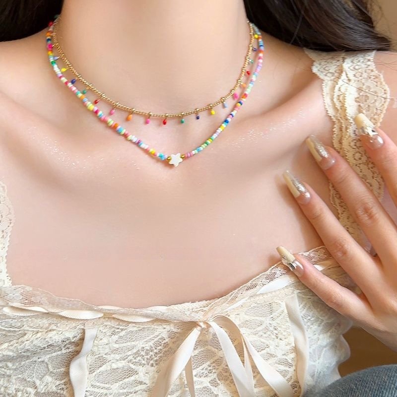 Dopamine สีลูกปัด Star สร้อยคอผู้หญิงสองชั้น Clavicle Chain Niche Design สร้อยคอ