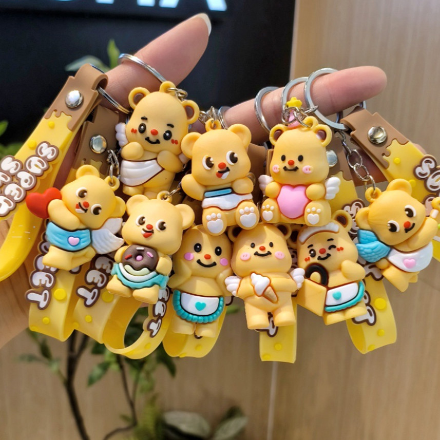 พวงกุญแจหมีเนยรูปน่ารักสร้างสรรค์ดูแลหมีรุ่นพวงกุญแจของขวัญ