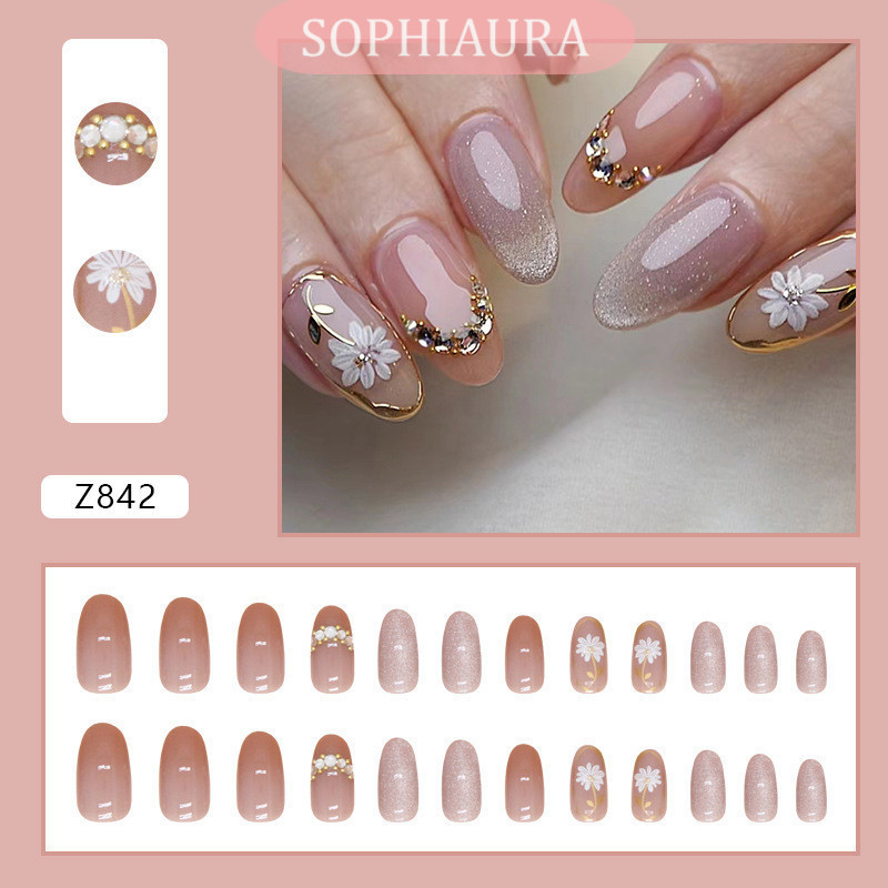 Sophiaura 24 ชิ้น Elegant Daisy Cat Eye Gold-Edged สวยสั้นอัลมอนด์นํากลับมาใช้ใหม่เล็บ Artnail Patch ที่ถอดออกได้เล็บปลอมกดบนเล็บเล็บปลอม