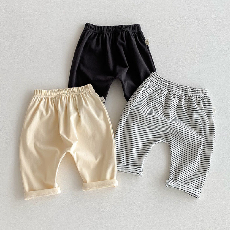 กางเกงเด็กสไตล์ฤดูใบไม้ผลิกับฤดูใบไม้ร่วง กางเกงแจ็คเก็ตลายลำลอง และเลกกิ้งมีเบาะรองก้นสำหรับทารกทั้งชายและหญิง