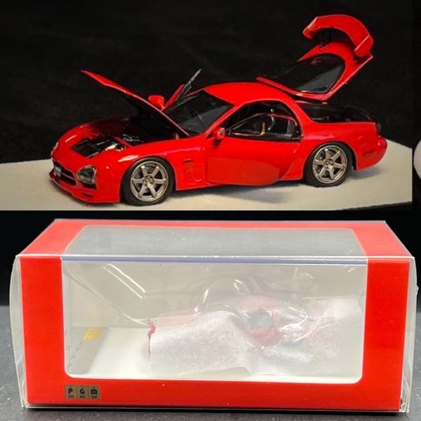 PGM 1:64
Mazda RX7 Red Color. Diecast Fully Opened.Square box