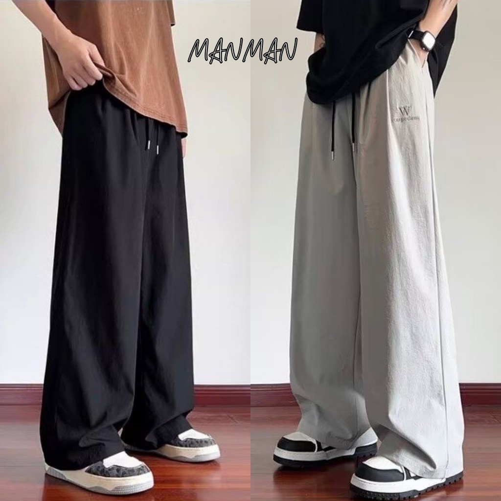 MANMAN กางเกงขายาวผู้ชาย รุ่นขากว้าง ทรงตรง แฟชั่น ลำลอง แมทช์ลุคง่าย กีฬา เชือกรูด