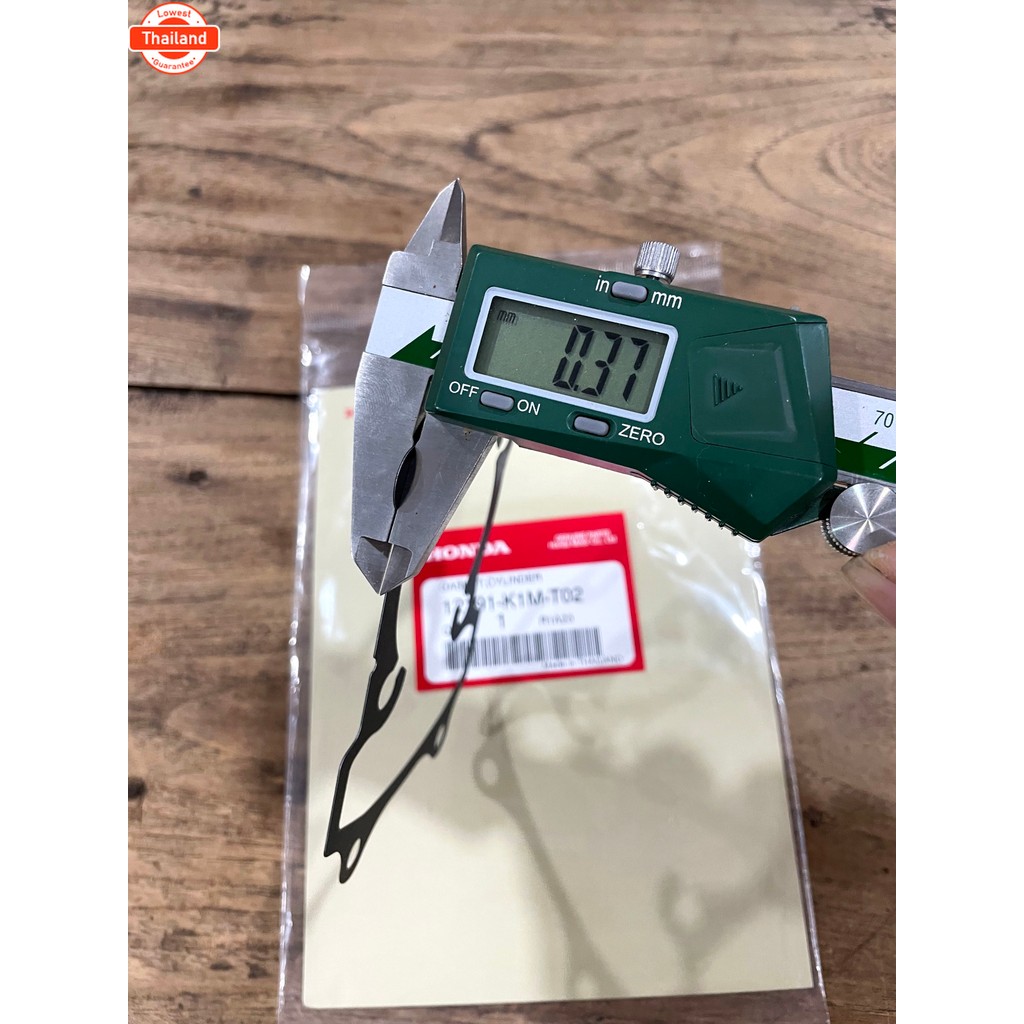 ประเก็นเสื้อสู / ประเก็นเสื้อสูตัวล่าง grom125 อะไหล่แท้ ฮอนด้า  12191-K1M-T02