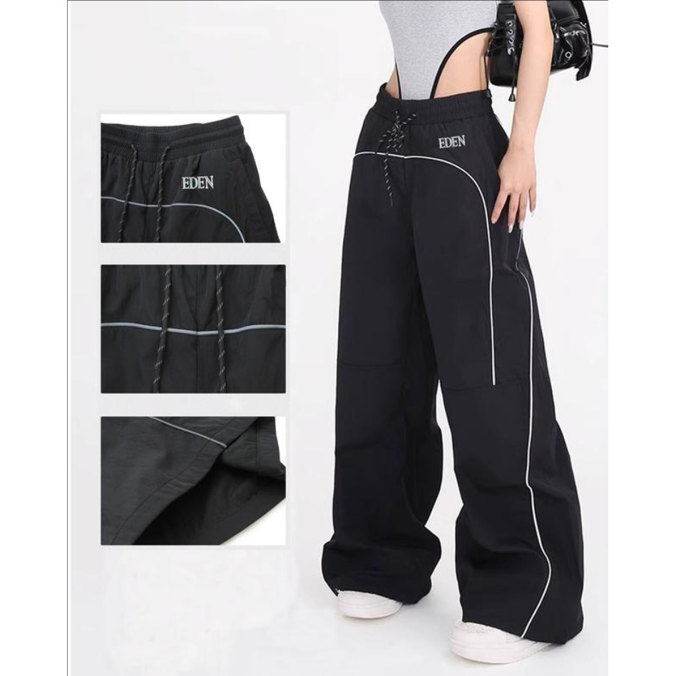 กางเกงกันน้ําสะท้อนแสง Eden Studio สไตล์เรโทร ออกแบบมาให้สวมใส่ง่ายด้วยเชือกรูด ทรงหลวมและทรงตรง เหม