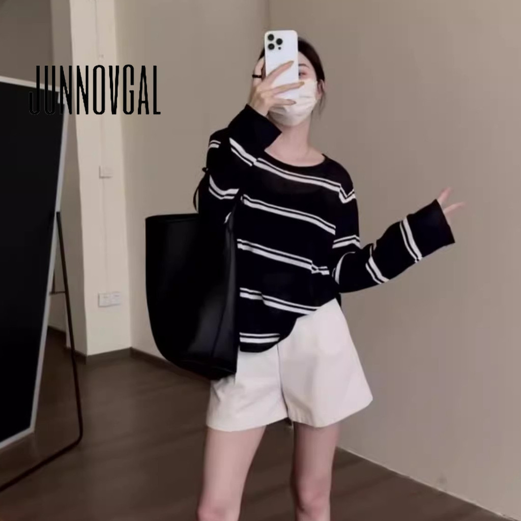 JUNNOVGAL เสื้อยืดผู้หญิงถักสีตัดกันลายทางสไตล์ใหม่ทรงหลวมแขนยาว