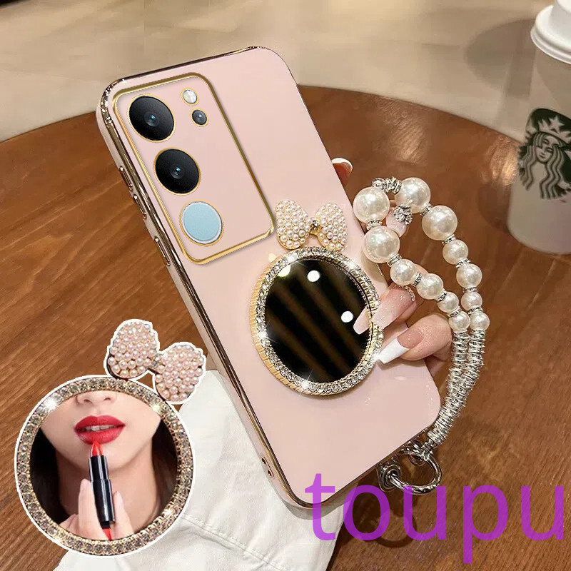 เคส Vivo V29 5G V30 5G V29E V27 5G V27E V25 V25E V23 5G V21 5G V19 ดีลักซ์เพิร์ลโบว์กระจกแต่งหน้าชุบซิลิโคนเคสโทรศัพท์แบบนุ่มพร้อมสร้อยข้อมือเชือกเส้นเล็กเคสโทรศัพท์ Vivo V29 5G V30 5G V29E V27 5G V27E V25 V25E V23 5G V21 5G V19