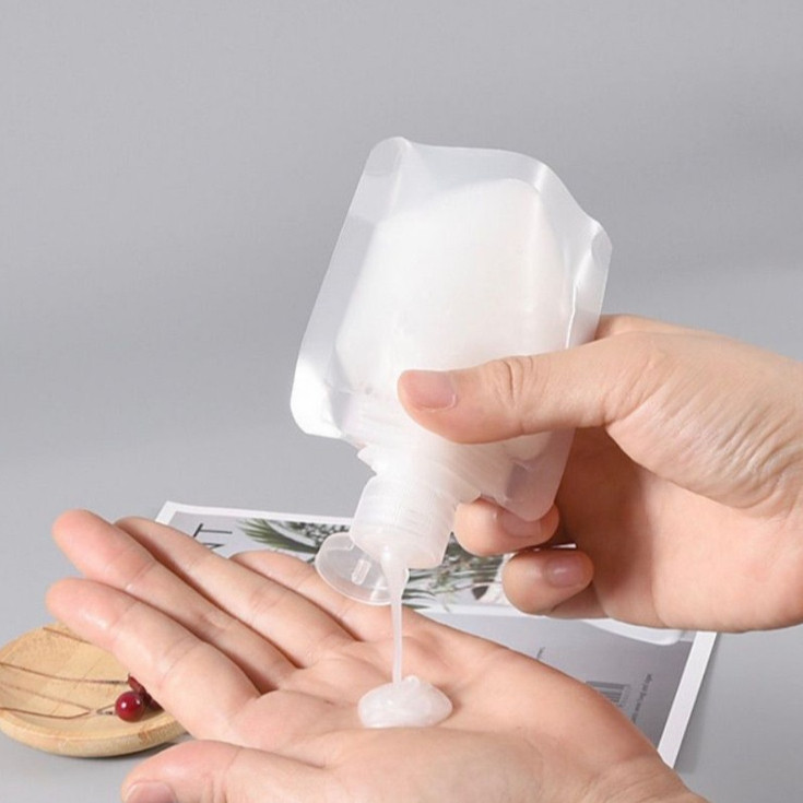 DHL WHOLESALE ขวดเติมสําหรับแชมพูสบู่เหลว travel พลาสติก fliptop organizer 30ML 50ML 100ML โปร่งใสเต