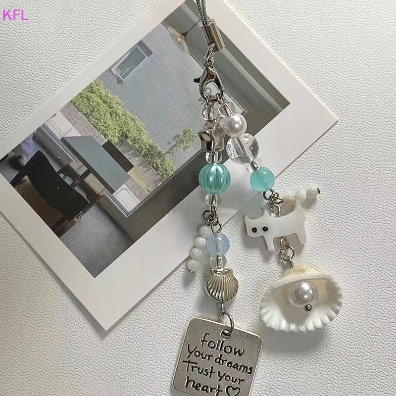 (เคเอฟแอล) ดอกไม้หัวใจลูกปัดสร้อยข้อมือเชือกเส้นเล็กที่มีสีสันโทรศัพท์เสน่ห์กระเป๋าโทรศัพท์มือถือจี้โซ่ขายร้อน