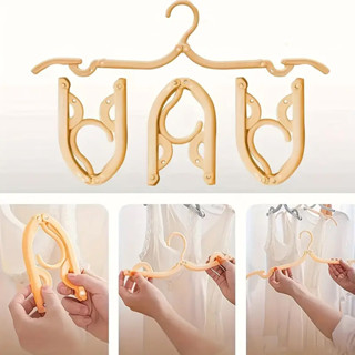 ไม้แขวนเสื้อพับได้ ไม้แขวน ขนาดพกพา สีพาสเทล ไม้แขวนเสื้อพับ…