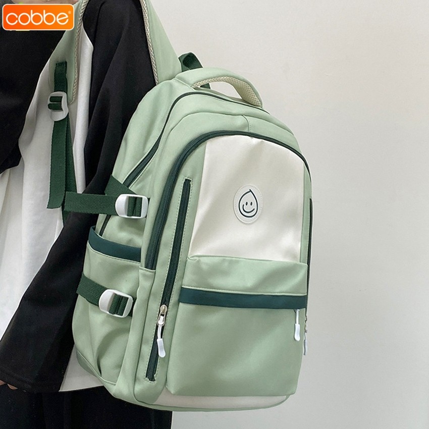 Cobbe กระเป๋าเป้ผู้หญิง/ผู้ชาย กระเป๋าสีพื้นแฟชั่น รูปยิ้ม สําหรับนักเรียนชาย และหญิง เหมาะกับการเดินทาง วัสดุผ้าไนล่อน
