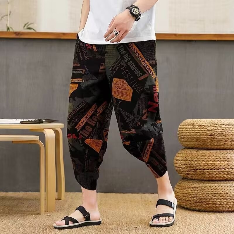 ชุดกีฬาผู้หญิงผู้ชาย 7 จุดลําลองหลวมอินเทรนด์สีคมชัดฮาเร็มตัดกางเกงผู้ชาย Over-the-Knee กางเกงดอกไม้