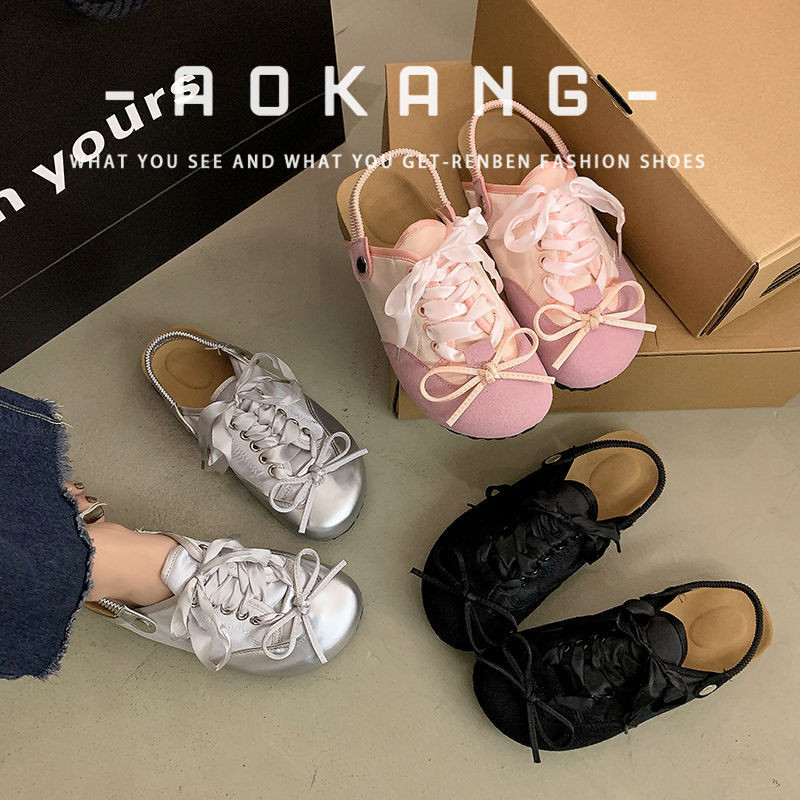 Aokang รองเท้าลําลองทรงกลมสีเงินหัวเข็มขัดพื้นหนาสําหรับผู้หญิงใหม่