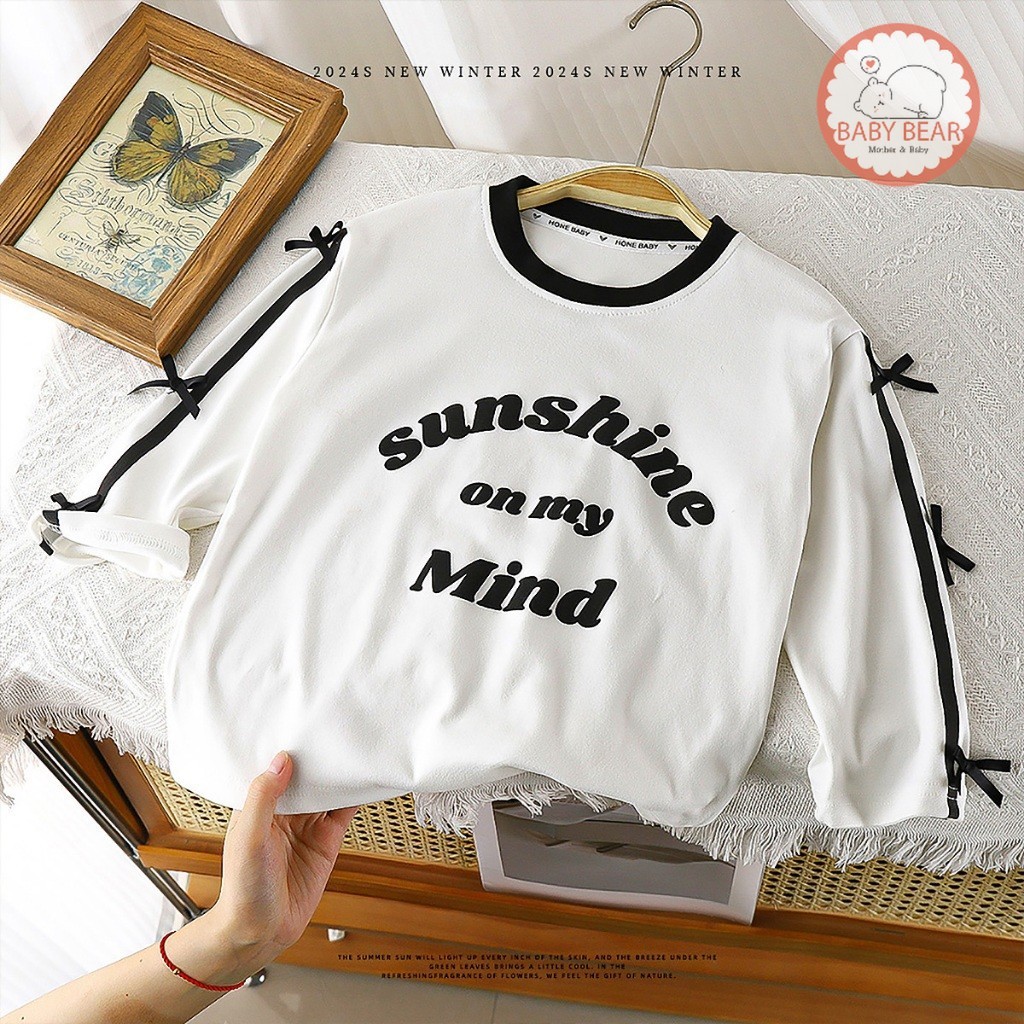 เสื้อผ้าเด็กผู้หญิง เสื้อยืดแขนยาวสีขาว ติดโบว์ แฟชั่นสไลต์เกาหลี size80-110cm