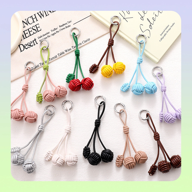 แฟชั่น All-Match Candy สี PU สายหนังจี้โทรศัพท์มือถือทอมือจี้ Double Ball Niche โทรศัพท์มือถือแขวนโซ่