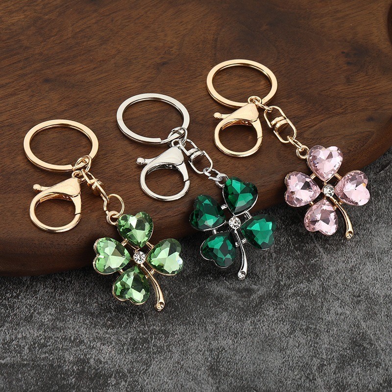 ใหม่ Creative Diamond-set Four-leaf Clover พวงกุญแจเลียนแบบคริสตัล Rhinestone Cats Eye หินสีประณีตพวงกุญแจ